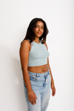Young woman poses confidently