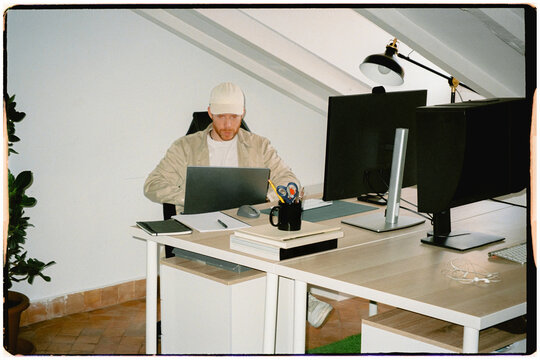 Film image of professional publicist doing work tsks with a notebook