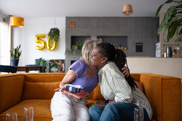 Happy women friends celebrating birthday 