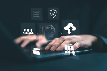 Businesswoman using laptop to document management concept, online documentation database and...