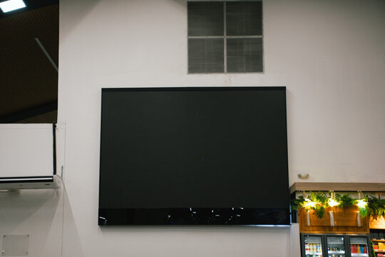 Large TV screen in airport terminal 