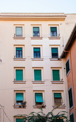 Fototapeta premium Green Shutters in Civitavecchia Italy
