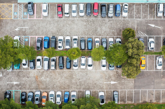 Aerial View Efficient Urban Parking Lot Design with Green Surrou