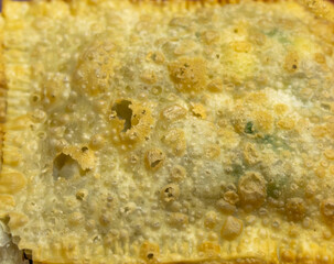 Traditional Brazilian fried pastry stuffed with ground beef. 