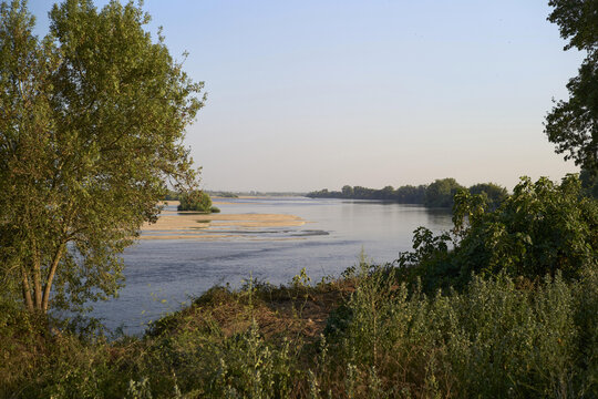 Serene riverbanks of the Tejo in Portugal during golden hour