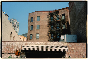 Film photo capturing fire escape of an apartment complex in New York