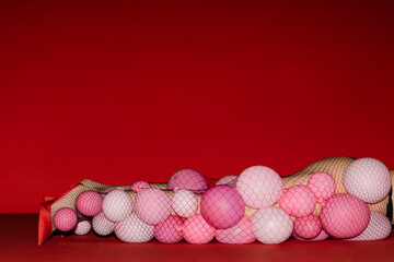 Abstract Composition of Pink and Red Spheres with Net Overlay
