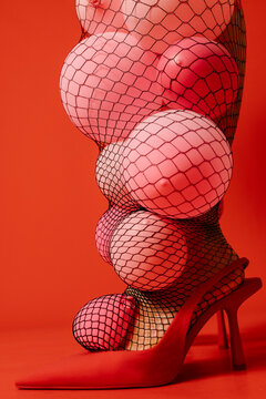 Creative Abstract Fashion Concept with Bold Red Accents