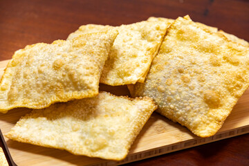 Traditional Brazilian fried pastry stuffed with ground beef. 
