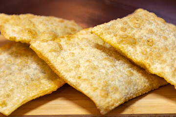 Traditional Brazilian fried pastry stuffed with ground beef. 