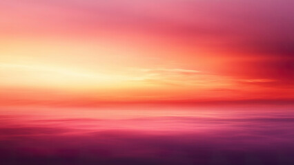 Obraz premium Vibrant sunset over a calm ocean creates a serene atmosphere at twilight