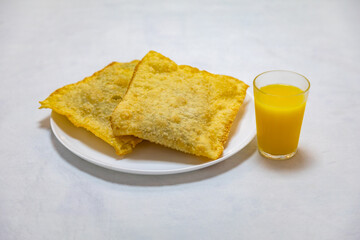 Traditional Brazilian fried pastry stuffed with ground beef. 