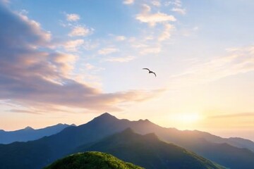 Scenic mountain landscape at sunrise with a flying bird.