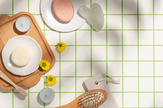 Natural Bath Products on White and Green Grid Surface