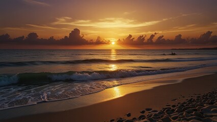 Sunset over ocean beach with waves.