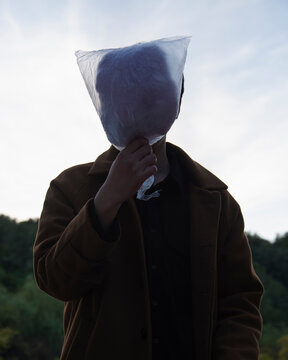 A man holding a cotton candy