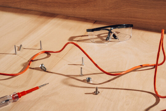 Scattered tools on timber
