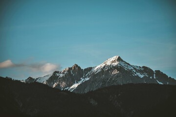 mountains and clouds sky blue snow