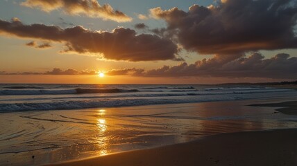 Obraz premium Vibrant sunset over ocean beach with waves. (2)