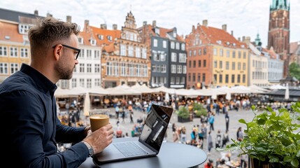 Bleisure travel concept. A man works on a laptop at a café terrace overlooking a vibrant city square.