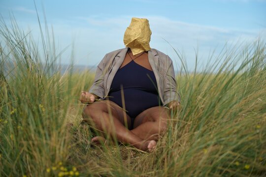A quiet moment of reflection in the grassy dunes