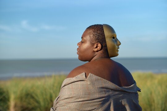 A contemplative moment by the serene seaside