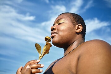 Golden flower celebrates beauty in sky