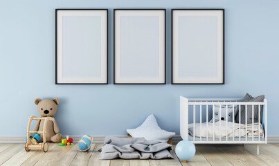 Empty frames above a crib in a blue and white nursery with toys