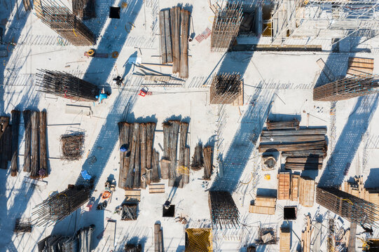 Aerial View of Construction Site with Steel Rebar and Materials