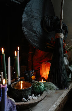witchy halloween decor on a hearth