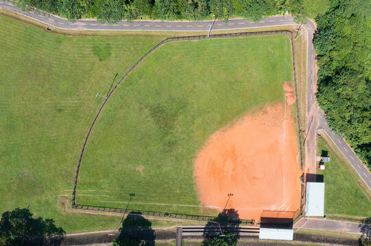 Aerial View of Baseball Field with Green Outfield and Dugouts