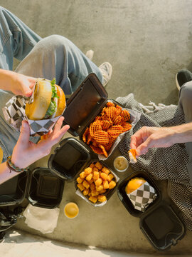 UGC Eating Take Out Meal Together Outdoors