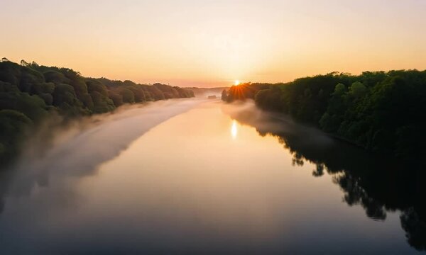 A misty river at dawn