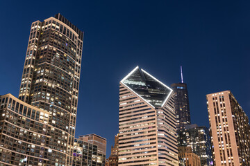 Business city. Night cityscape of Chicago skyscraper building. Chicago architecture of skyscraper....