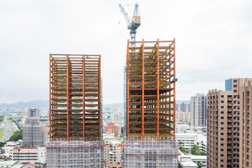 Twin High Rise Construction Steel Framework Rising Above Urban L