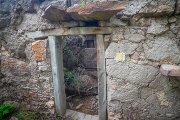 Old house in ruins at sunset framed by a tree, in Rancho Los Cardos in Monte Escobedo, Zacatecas