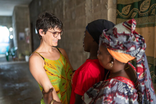 A white woman visiting her Senegalese friends in Senegal