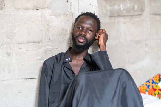 Senegalese model posing in black outfit in dakar