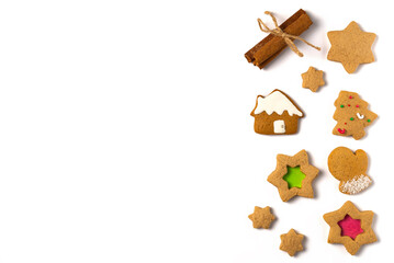 Gingerbread cookies with decorations on white background. Christmas concept. Flat lay, top view. Copy space