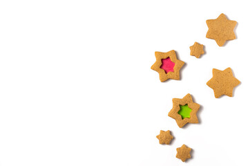 Gingerbread cookies stars on white background. Christmas concept. Flat lay, top view. Copy space