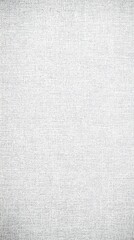 Fototapeta premium Soft white fabric texture with subtle pattern illuminated by natural light in a bright room