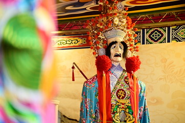 White Impermanence, also known as Bai Wu Chang, is a deity in Taoist belief, symbolizing the transition between life and death. This figure is often found in temples, representing the balance of fate.