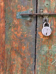 A wooden door with a lock on it, Spiti Valley India.