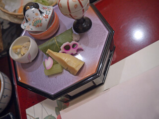 Kaiseki appetizer meals for fancy Japanese dinner served on lacquered tray