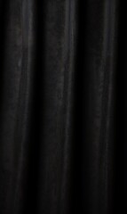 Fototapeta premium Black fabric background. Black cloth texture
