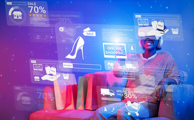 African teenager with VR glass looking at screen display discount. Person sitting at sofa while...