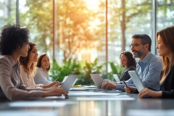Diverse team of professionals engaged in business meeting discussing legal documents and financial consultancy in modern office setting