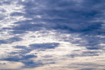 Obraz premium Capture the essence of a perfect day with this stunning image of a vibrant blue sky adorned with fluffy white clouds. 