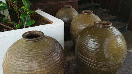 Rustic Clay Pots Arranged Outdoors in a Natural Garden Setting