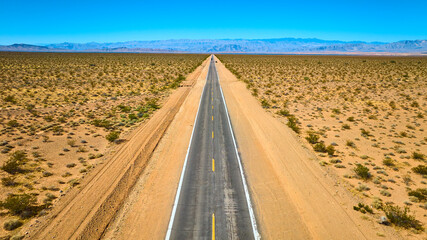 Fototapeta premium Aerial of Desert Road in Nevada Mojave Landscape